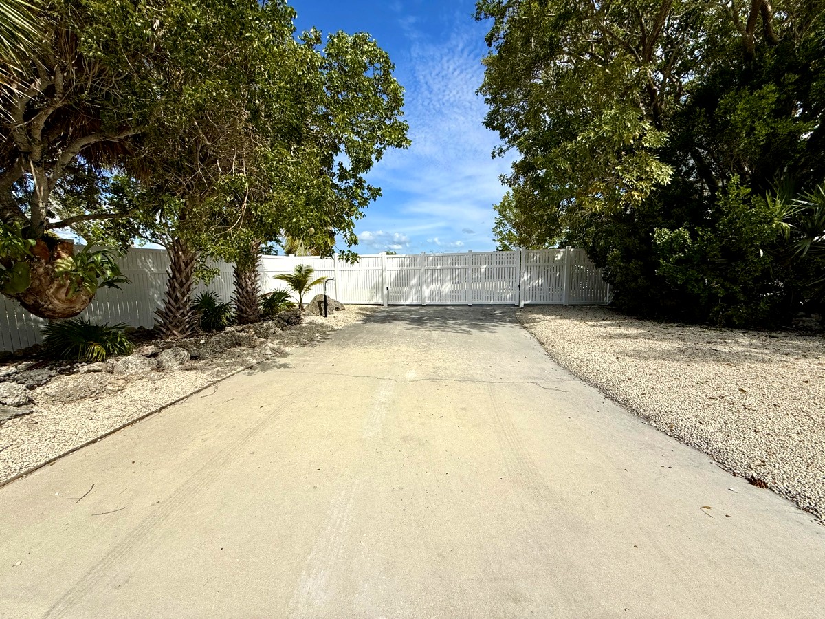 Gated entrance with perimeter fence